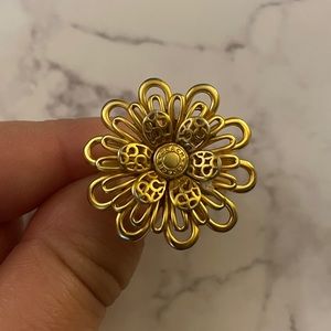 Gold colored Coach Flower ring